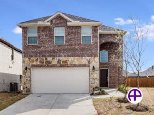 Stunning exterior view of a two-story brick home with enhanced sky replacement