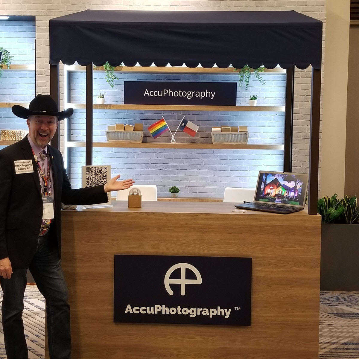 Rick a. Fogerty (cowboy rick) at the accuphotography booth during the chase make your move event at the omni pga frisco resort