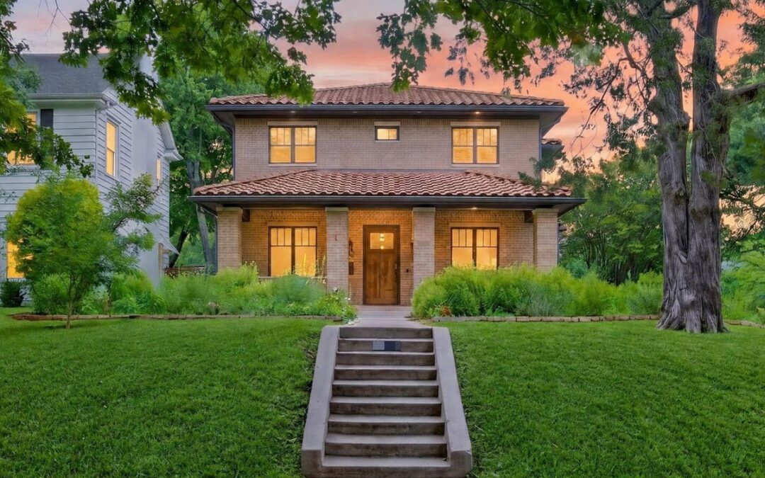 Dusk twilight exterior view of a Spanish-style Dallas Texas rental property showcasing professional rental property photography.